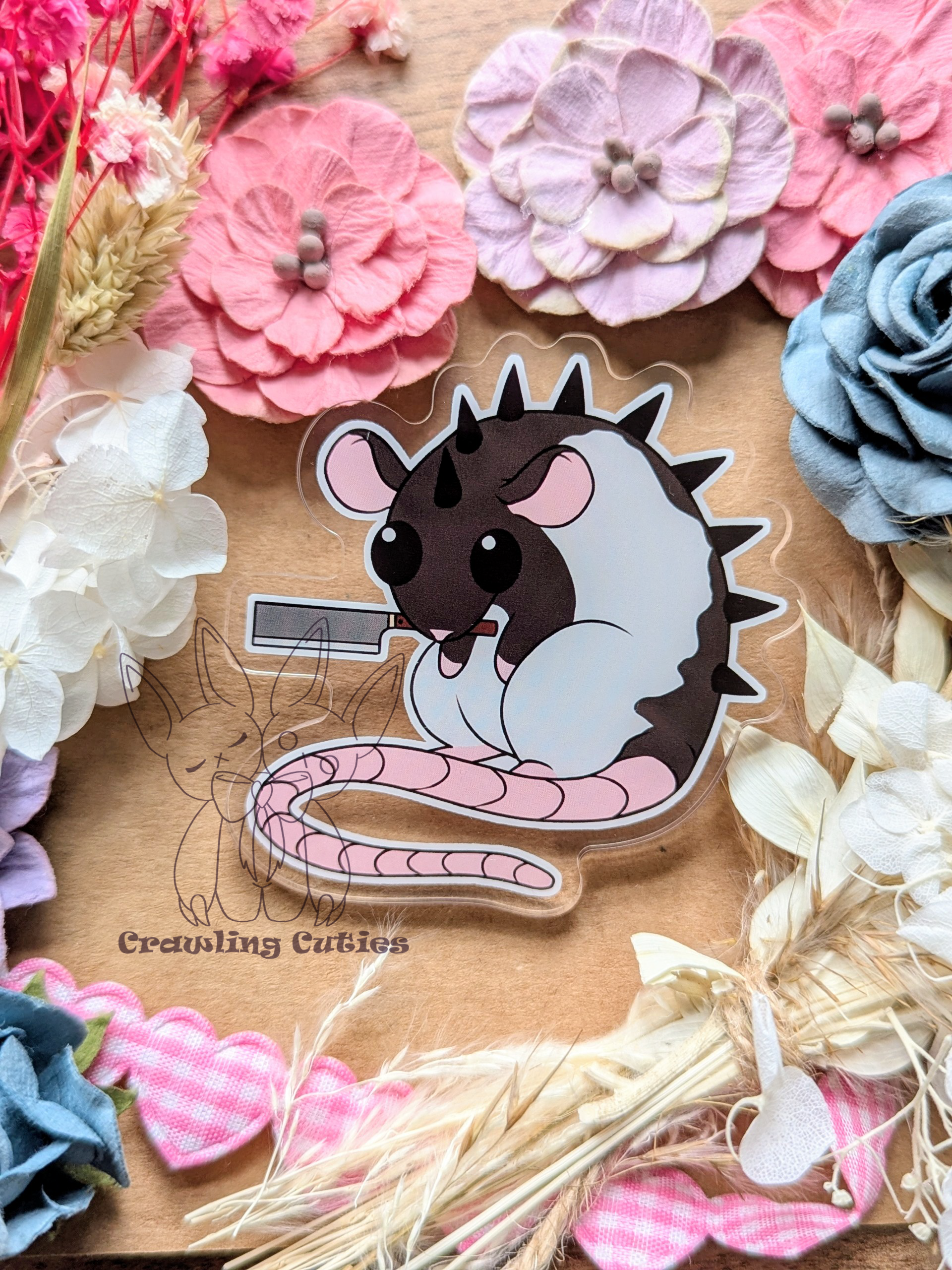 Little rat with a knife pin
