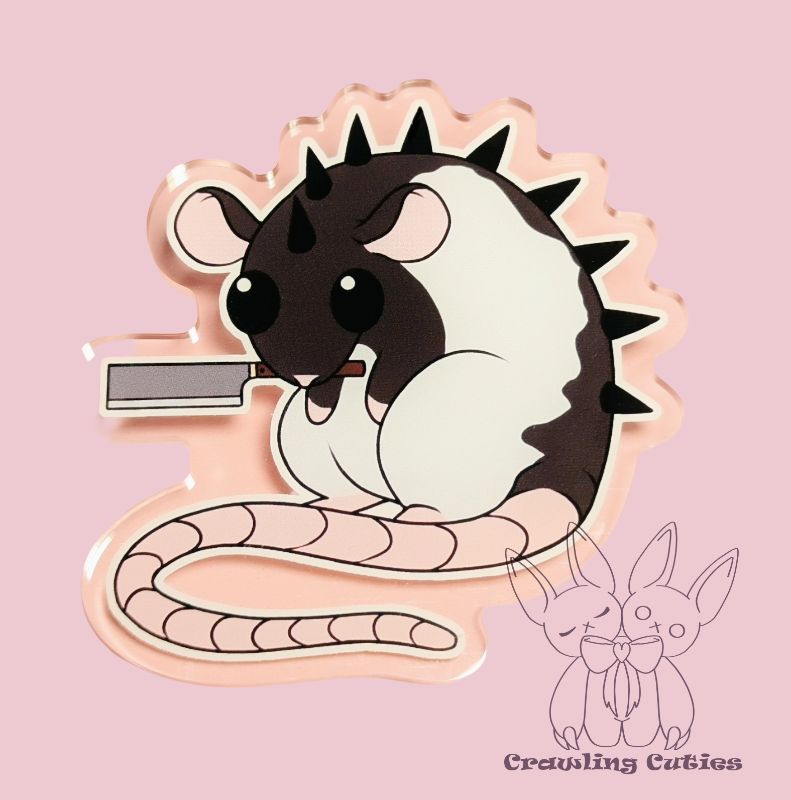Little rat with a knife pin